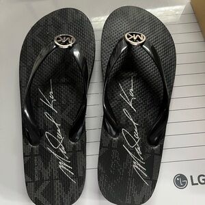Michael Kors New in box flip-flops